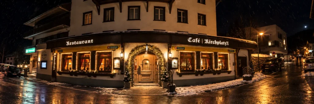 Kirchplatz’l Alpine Food & Bar bei Nacht